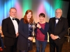 Joan Giller accepting the Ray Leonard Cup Blue Riband award for overall Winner of the 48th Claremorris Drama and Fringe festival on behalf of the Schull Drama Group for their Production of "No Mans Land" by Harold PinterL to R CiarÃ¡n McCauley (Adjudicator) Linda Beirne (Festival Treasurer) Joan Giller and Peter McCallig (Festival Chairman). Photo Â© Michael Donnelly